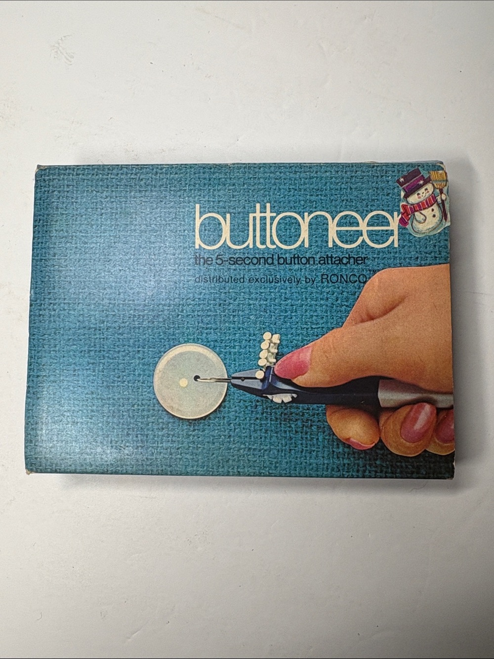 60s Ronco Buttoneer the 5-second button attached